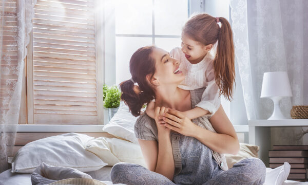 Happy,Loving,Family.,Mother,And,Her,Daughter,Child,Girl,Playing Happy loving family. Mother and her daughter child girl playing and hugging.