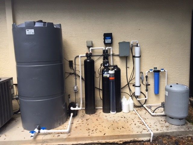 Whole-home water refining system installed to reduce hard water problems.